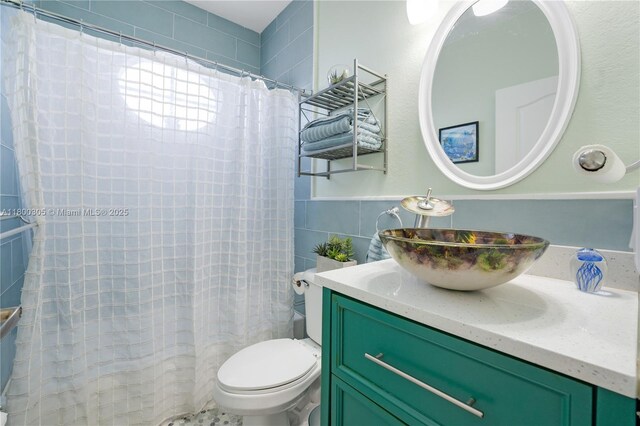 11324 NW 74th Ter, Doral, FL 33178 - bathroom featuring tile walls, toilet, vanity, and a shower with shower curtain