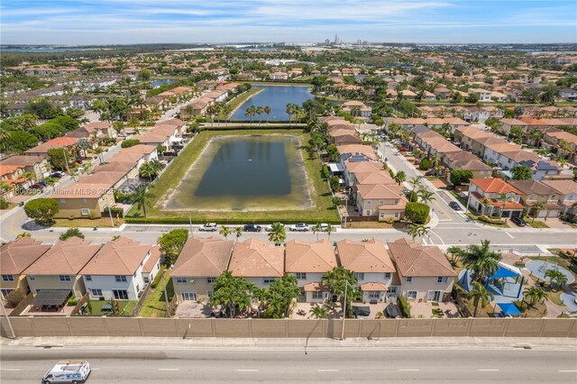 11324 NW 74th Ter, Doral, FL 33178 - aerial view of property and surrounding area with a nearby body of water and nearby suburban area