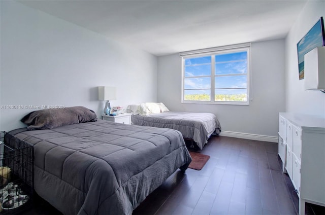 6770 Indian Creek Dr Unit 6O, Miami Beach, FL 33141 - bedroom featuring dark wood-type flooring and baseboards