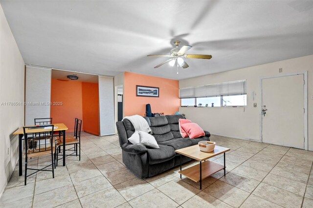 11930 NE 19th Dr Unit 15, North Miami, FL 33181 - living room featuring a ceiling fan and light tile patterned floors