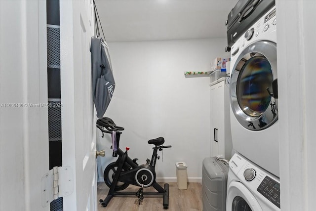 9831 SW 58th Ct, Cooper City, FL 33328 - laundry room with estacked washer and dryer and light wood-style floors