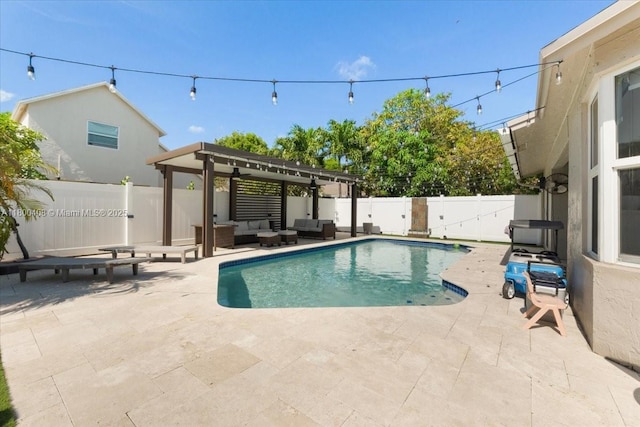 9831 SW 58th Ct, Cooper City, FL 33328 - view of swimming pool featuring an outdoor hangout area, a patio, and a fenced backyard