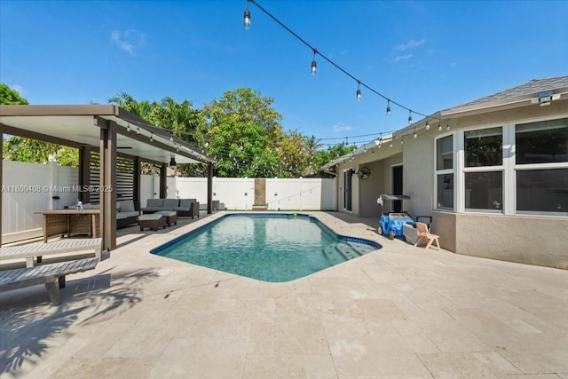9831 SW 58th Ct, Cooper City, FL 33328 - view of pool with outdoor lounge area, a patio, and a fenced backyard