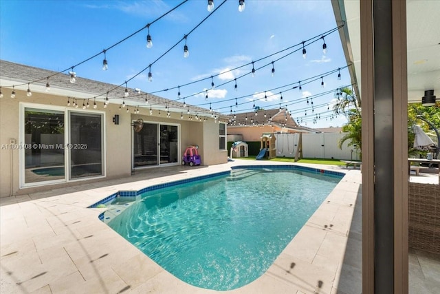 9831 SW 58th Ct, Cooper City, FL 33328 - view of swimming pool with a patio and a fenced backyard
