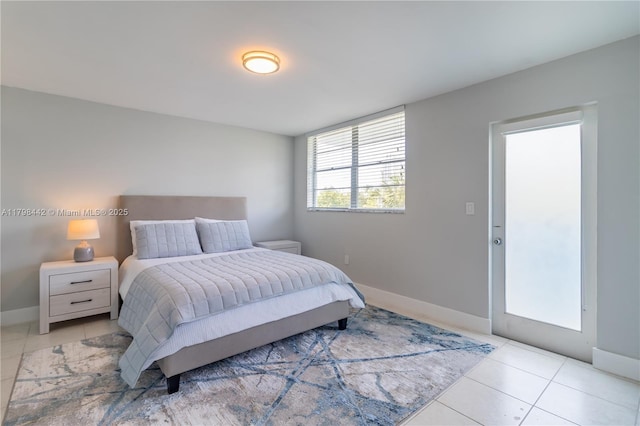 301 Jefferson Ave Unit 4D, Miami Beach, FL 33139 - tiled bedroom featuring baseboards