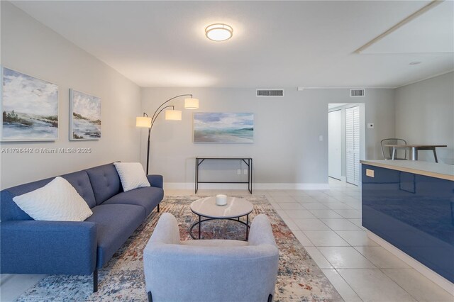301 Jefferson Ave Unit 4D, Miami Beach, FL 33139 - living area featuring baseboards and light tile patterned flooring