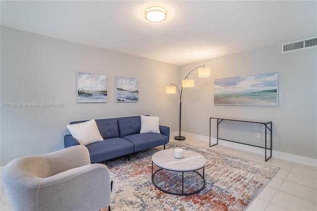 301 Jefferson Ave Unit 4D, Miami Beach, FL 33139 - tiled living area featuring baseboards