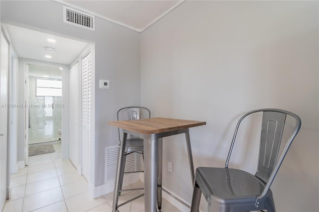 301 Jefferson Ave Unit 4D, Miami Beach, FL 33139 - dining space with light tile patterned floors and baseboards