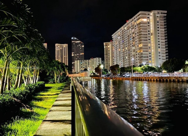 400 Kings Point Dr Unit 309, Sunny Isles Beach, FL 33160 - water view featuring a view of city lights