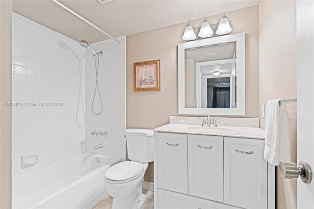 bathroom featuring toilet, vanity, and tub / shower combination