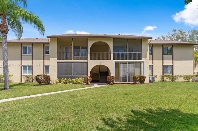 322 Pine Ridge Cir Unit A-2, Green Acres, FL 33463 - view of building exterior with cooling unit