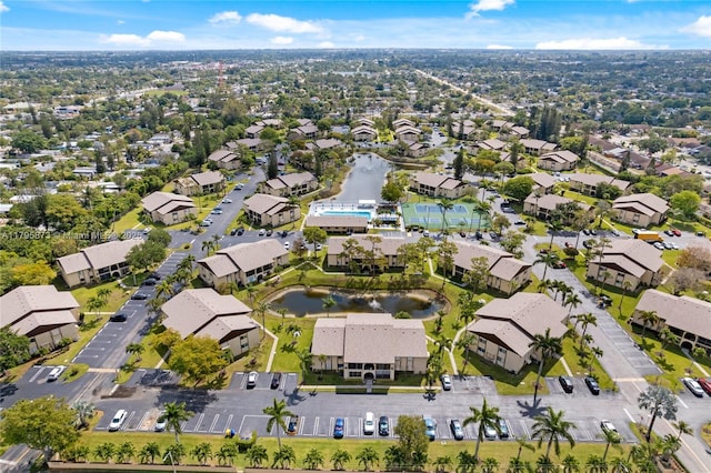 322 Pine Ridge Cir Unit A-2, Green Acres, FL 33463 - aerial overview of property's location with a nearby body of water and nearby suburban area