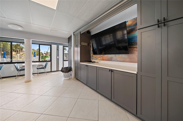 322 Pine Ridge Cir Unit A-2, Green Acres, FL 33463 - bathroom featuring tile patterned floors and a paneled ceiling