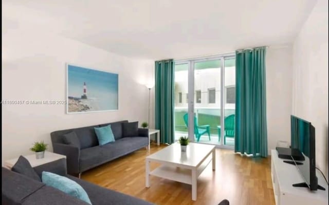 3901 S Ocean Dr Unit 2Z, Hollywood, FL 33019 - living room featuring wood finished floors