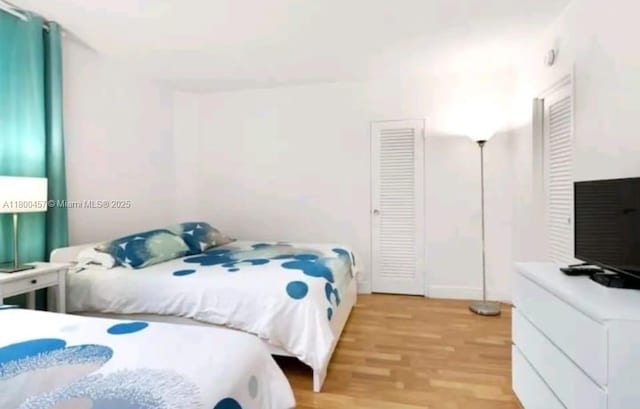 3901 S Ocean Dr Unit 2Z, Hollywood, FL 33019 - bedroom featuring light wood-type flooring