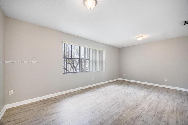 2933 SE 2nd St Unit 20, Homestead, FL 33033 - unfurnished room with wood finished floors and baseboards