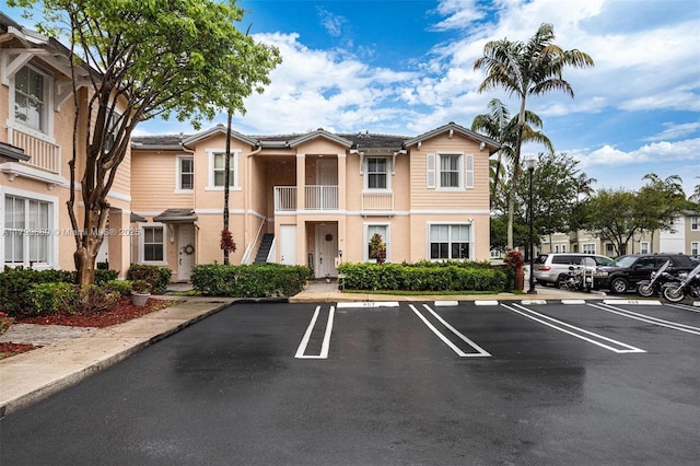 2933 SE 2nd St Unit 20, Homestead, FL 33033 - view of building exterior featuring uncovered parking