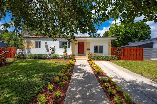 12000 NE 11th Ct, Biscayne Park, FL 33161 - view of front of home featuring stucco siding