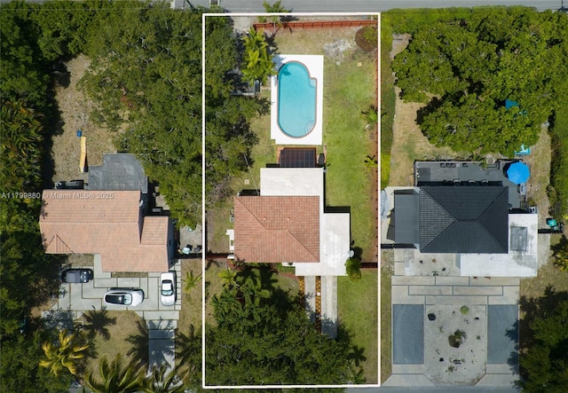 12000 NE 11th Ct, Biscayne Park, FL 33161 - aerial view of property and surrounding area featuring property parcel outlined and a pool