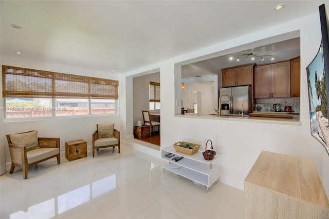 12000 NE 11th Ct, Biscayne Park, FL 33161 - living area with light tile patterned flooring, baseboards, and recessed lighting