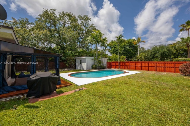 12000 NE 11th Ct, Biscayne Park, FL 33161 - view of pool with a storage unit, area for grilling, an outbuilding, and a gazebo