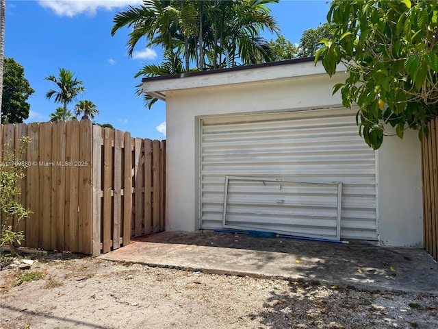 12000 NE 11th Ct, Biscayne Park, FL 33161 - garage with fence