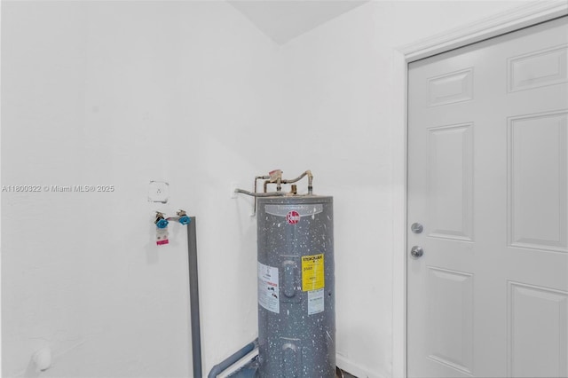 3051 NW 77th St, Miami, FL 33147 - utility room featuring electric water heater