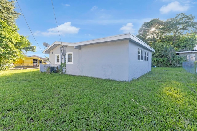 3051 NW 77th St, Miami, FL 33147 - view of property exterior featuring stucco siding