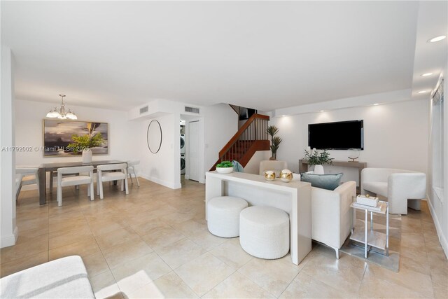 4730 SW 67th Ave Unit I1, Miami, FL 33155 - living area featuring stairs, a chandelier, baseboards, light tile patterned flooring, and recessed lighting