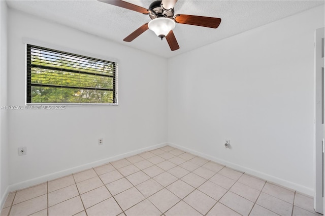 4730 SW 67th Ave Unit I1, Miami, FL 33155 - spare room with a textured ceiling, ceiling fan, baseboards, and light tile patterned floors