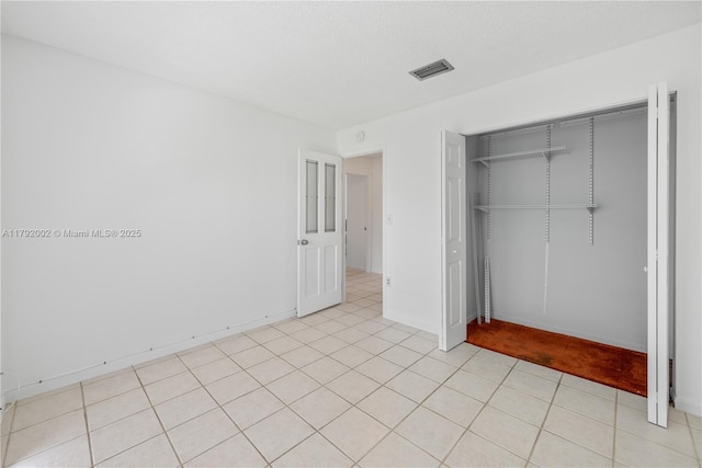 4730 SW 67th Ave Unit I1, Miami, FL 33155 - unfurnished bedroom featuring a closet and baseboards