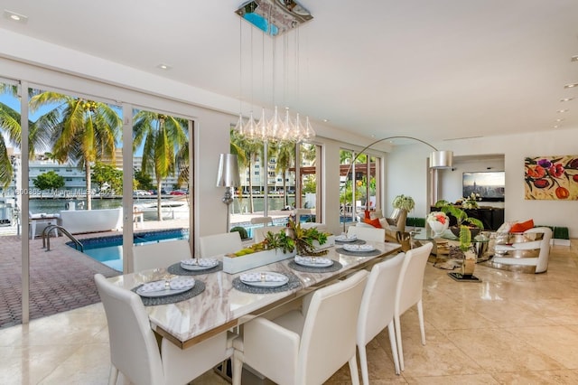 418 Tammarind Dr, Hallandale Beach, FL 33009 - dining room featuring plenty of natural light, light tile patterned floors, and recessed lighting