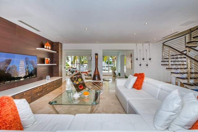 418 Tammarind Dr, Hallandale Beach, FL 33009 - living area with light tile patterned floors, recessed lighting, and stairway