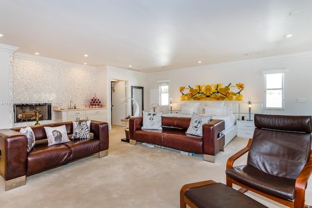 418 Tammarind Dr, Hallandale Beach, FL 33009 - living room featuring ornamental molding, light carpet, recessed lighting, and a large fireplace