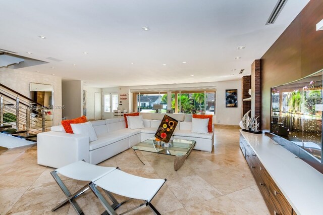 418 Tammarind Dr, Hallandale Beach, FL 33009 - living room featuring healthy amount of natural light and recessed lighting