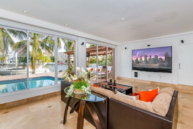 418 Tammarind Dr, Hallandale Beach, FL 33009 - living room with healthy amount of natural light and light tile patterned flooring