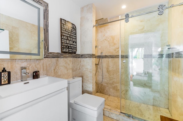 418 Tammarind Dr, Hallandale Beach, FL 33009 - bathroom featuring a shower stall, toilet, tile walls, and vanity