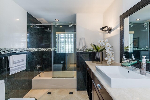 418 Tammarind Dr, Hallandale Beach, FL 33009 - bathroom with tile patterned floors, vanity, bath / shower combo with glass door, and recessed lighting