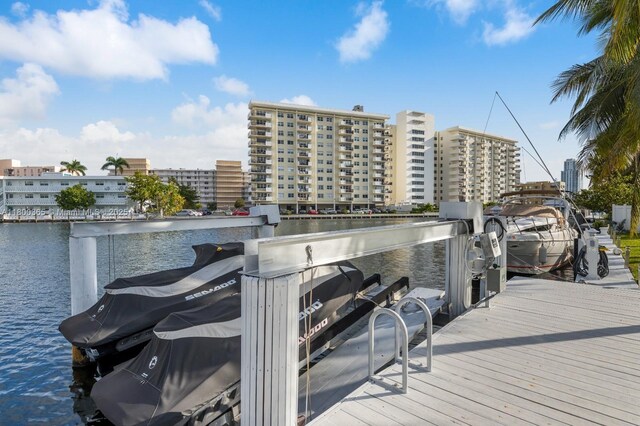 418 Tammarind Dr, Hallandale Beach, FL 33009 - dock featuring a water view and a view of city