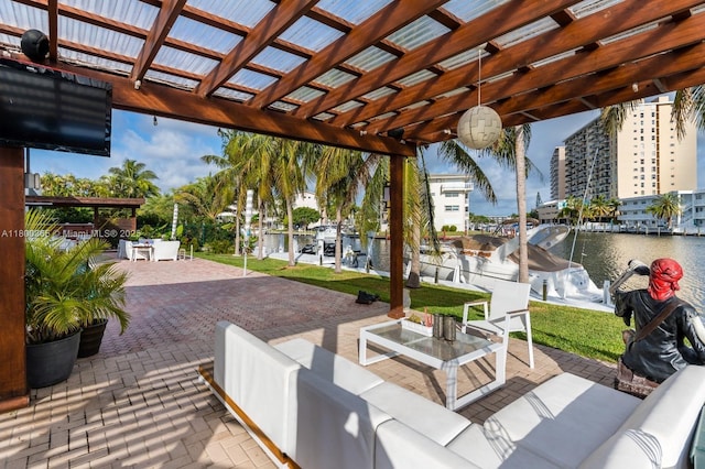 418 Tammarind Dr, Hallandale Beach, FL 33009 - view of patio / terrace with a pergola, a water view, a boat dock, and boat lift