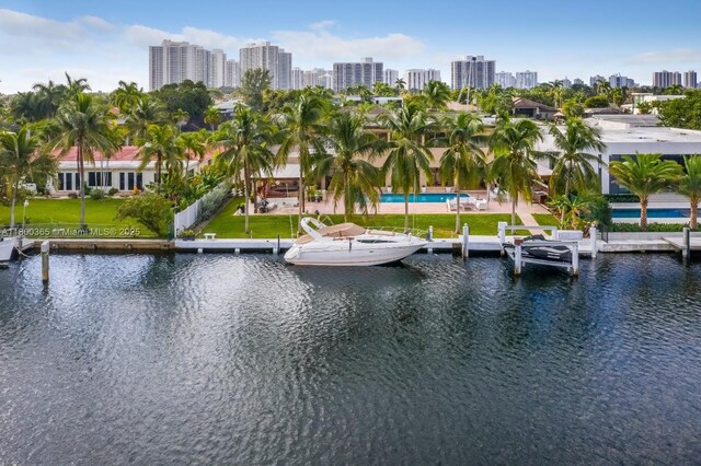 418 Tammarind Dr, Hallandale Beach, FL 33009 - water view with a view of skyline and a boat dock