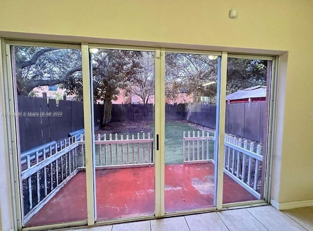 646 SW 7th Ter, Florida City, FL 33034 - entryway with tile patterned flooring and baseboards