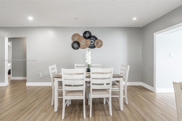 7450 Branch St, Hollywood, FL 33024 - dining room featuring light wood finished floors, baseboards, and recessed lighting
