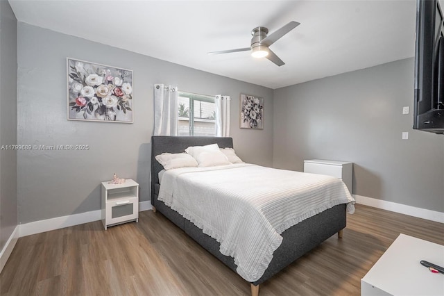 7450 Branch St, Hollywood, FL 33024 - bedroom with wood finished floors, baseboards, and a ceiling fan