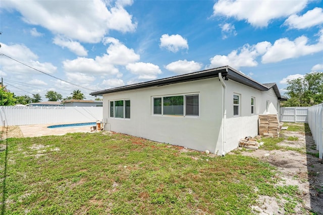 7450 Branch St, Hollywood, FL 33024 - rear view of property featuring stucco siding