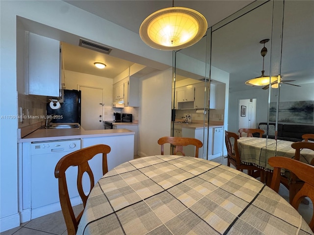 dining room with a ceiling fan