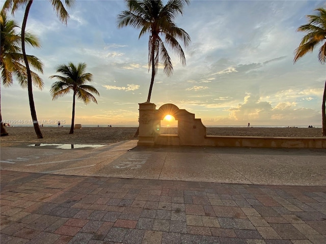 patio terrace at dusk with a water view