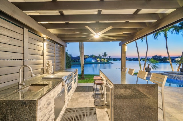 20230 NW 7th St, Pembroke Pines, FL 33029 - view of patio / terrace with an outdoor kitchen and a water view