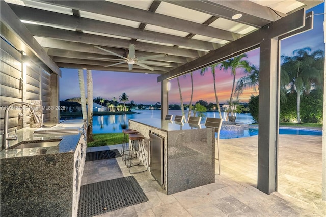 20230 NW 7th St, Pembroke Pines, FL 33029 - view of patio / terrace featuring a water view, a pool with connected hot tub, and a ceiling fan