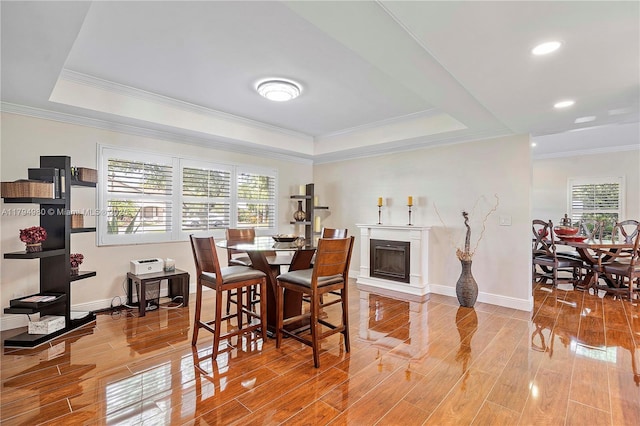 20230 NW 7th St, Pembroke Pines, FL 33029 - dining area with a tray ceiling, plenty of natural light, wood finished floors, ornamental molding, and recessed lighting